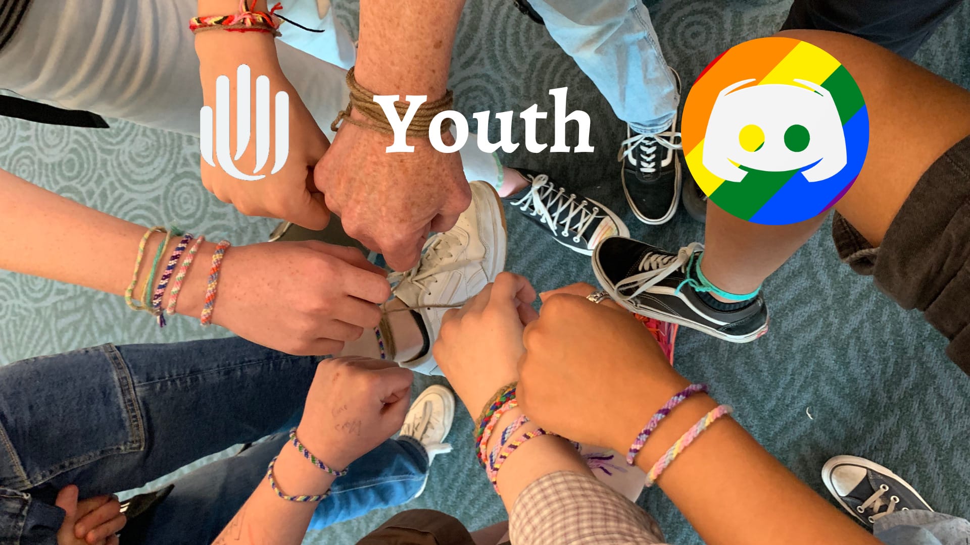circle of hands, young and old, showing off friendship bracelets with the caption "Youth".